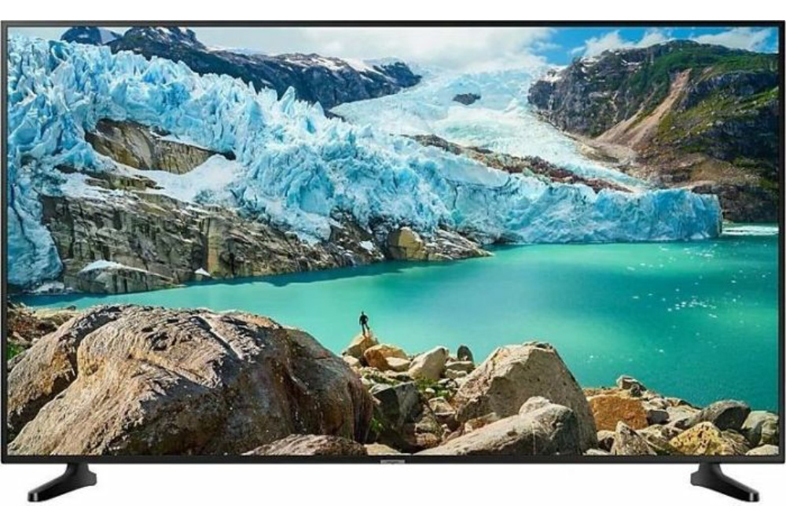 Flachbildfernseher mit zwei Standfüßen; auf dem Bildschirm sind Gletscher und ein türkisfarbener See zu sehen